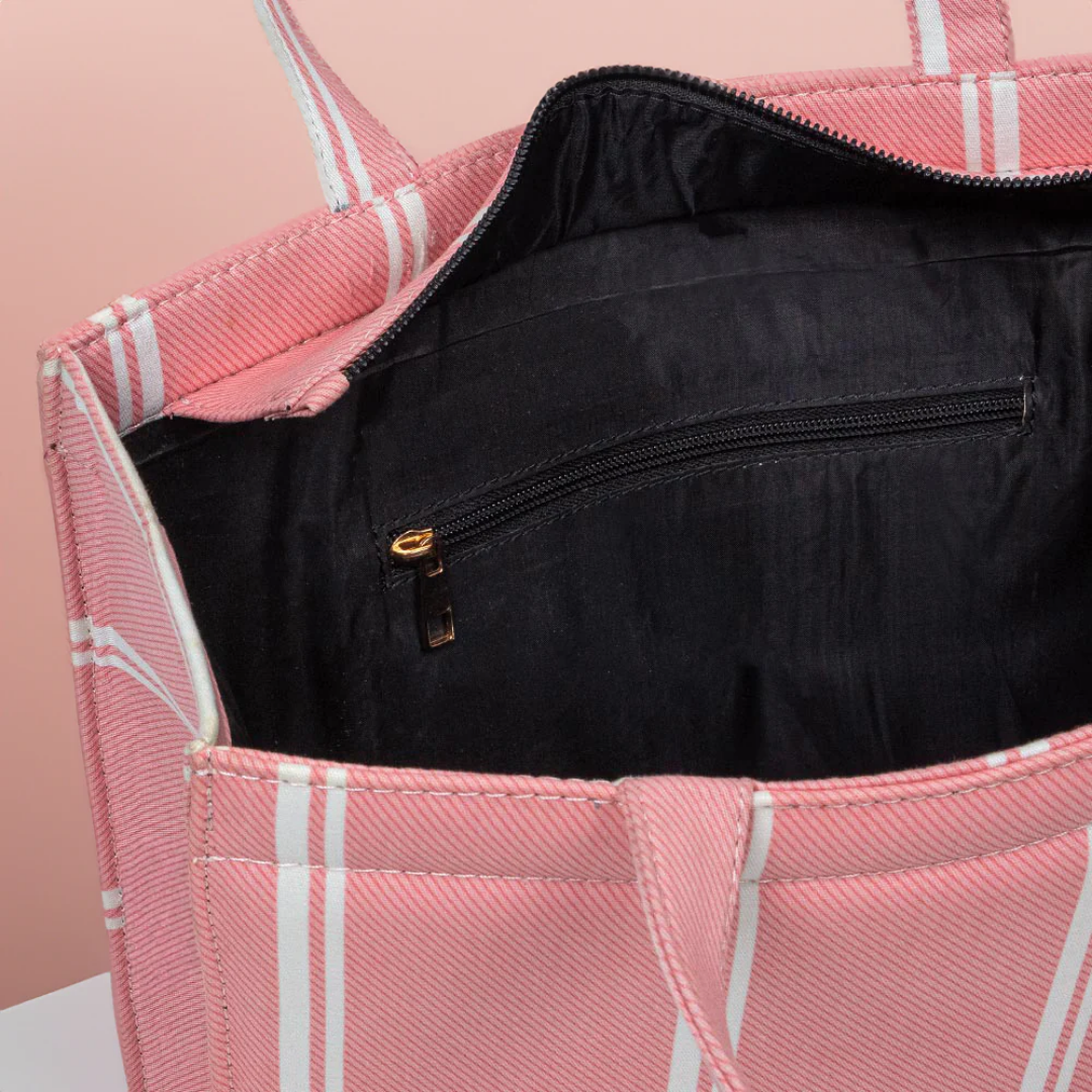 Bagwati pink mini canvas tote bag with white stripes and black zippered inner pocket