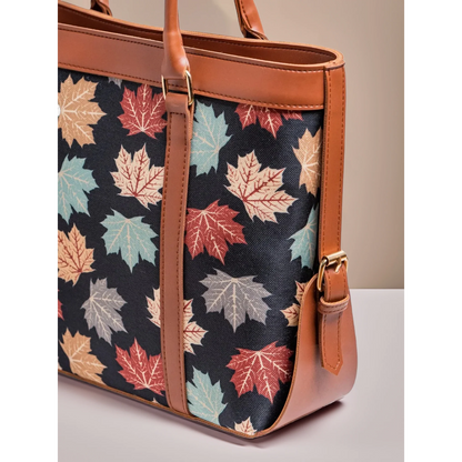 Bagwati black canvas tote bag with autumn leaf print and brown leather straps