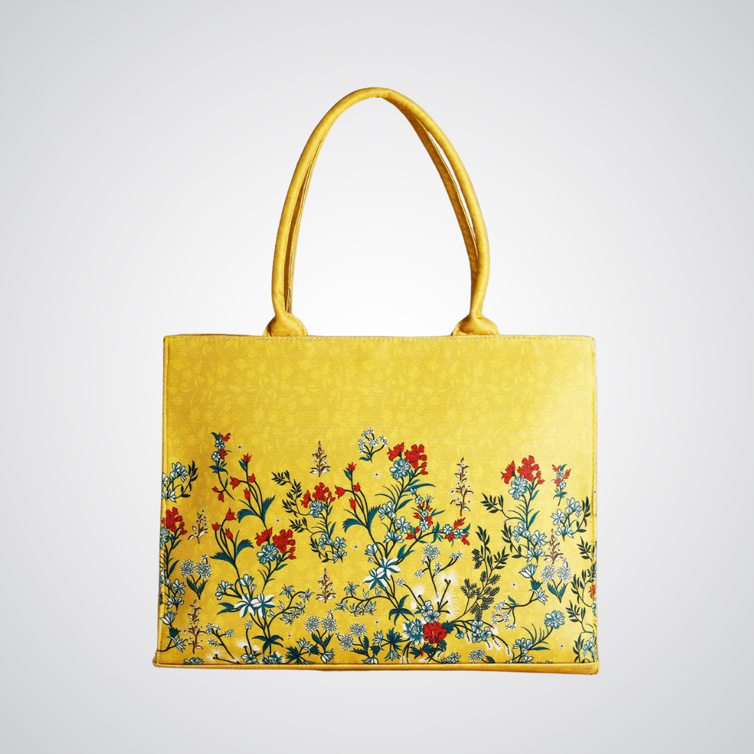 Bagwati yellow canvas tote bag with floral print, premium handbag on white background