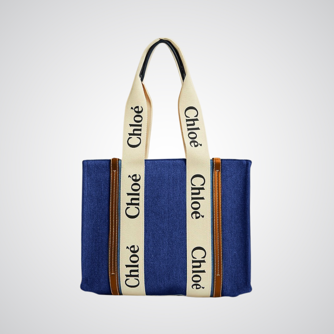 Blue canvas tote bag with cream logo straps, premium design from Bagwati handbags collection