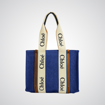 Blue canvas tote bag with cream logo straps, premium design from Bagwati handbags collection