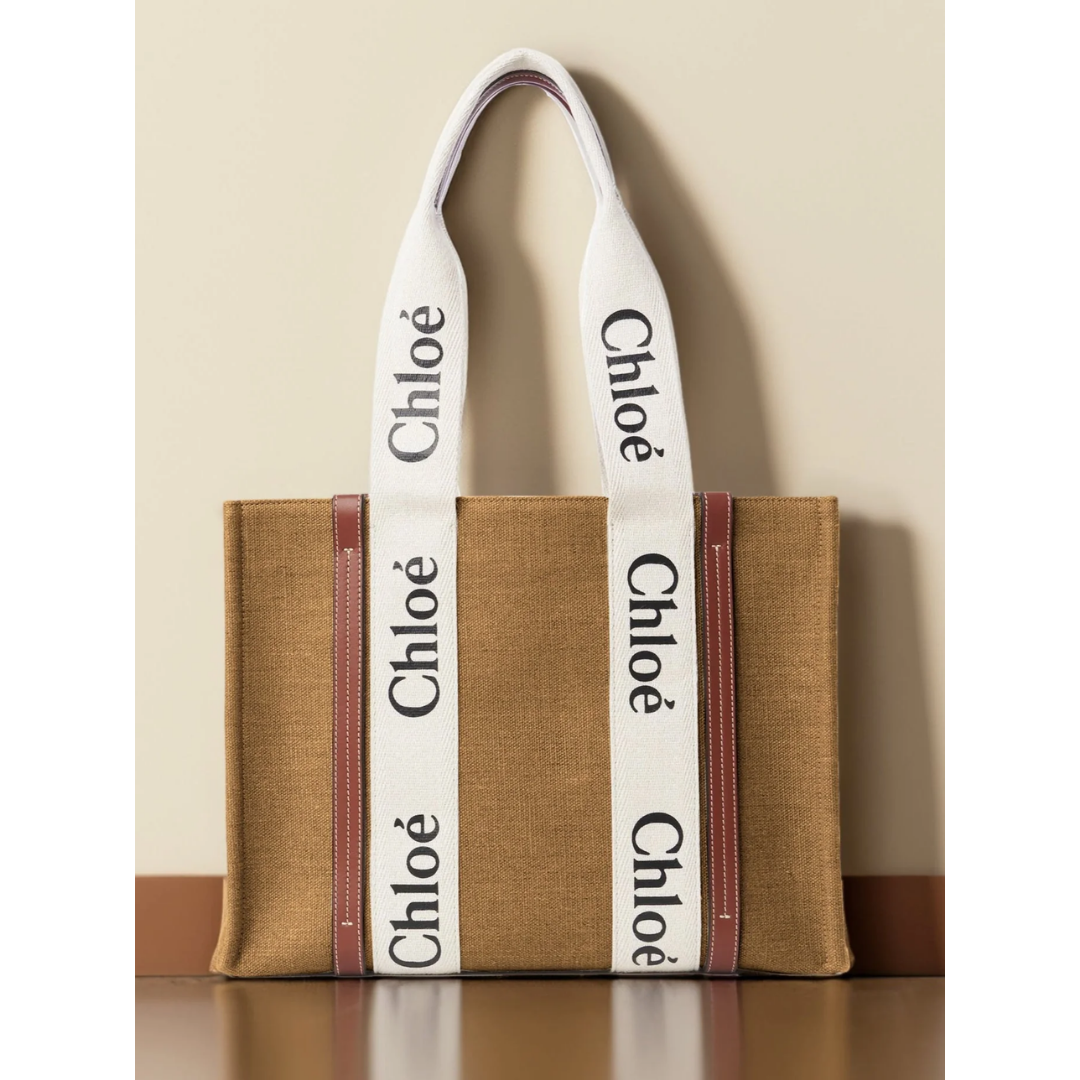 Light brown canvas tote bag with white Chloé logo handles, elegant handbag by Bagwati