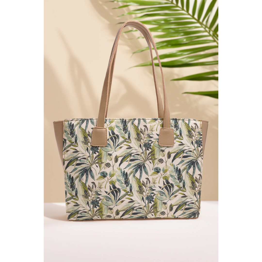 Beige Bagwati canvas tote bag with green forest leaf print, premium handbag on neutral background