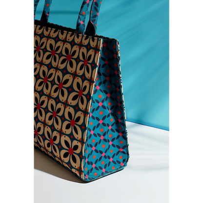 Bagwati geometric floral canvas tote bag in blue with bold patterns, elegant handbag
