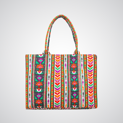 Bagwati colorful canvas tote bag with vibrant floral and geometric patterns, front view