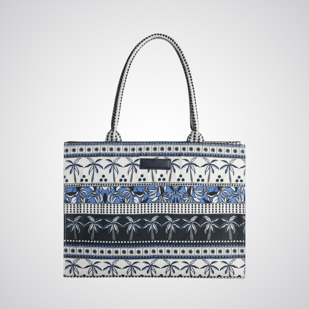 Bagwati blue and white palm tree canvas tote bag with double handles on white background