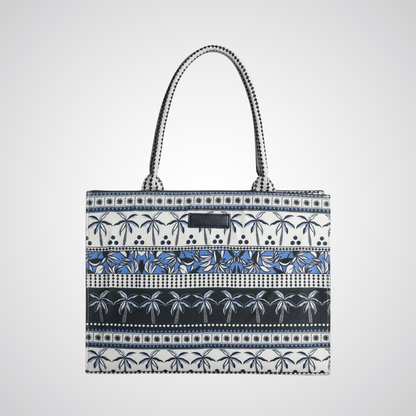 Bagwati blue and white palm tree canvas tote bag with double handles on white background