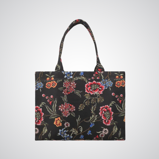 Bagwati black canvas tote bag with colorful floral pattern and shoulder straps